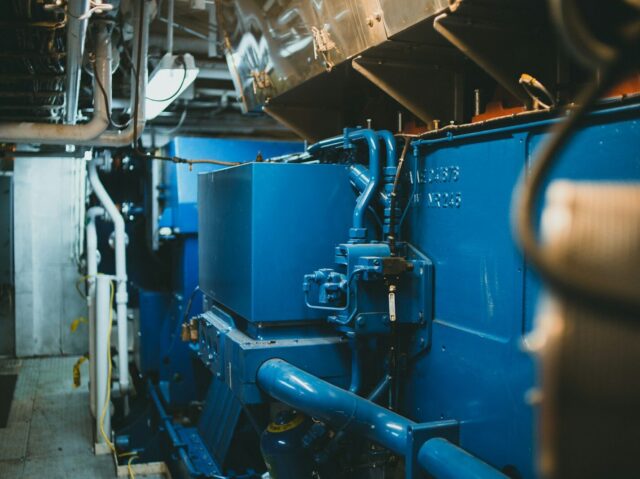 a large blue machine in a large room